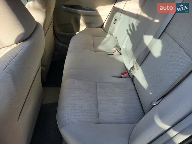 Чорний Тойота Королла, об'ємом двигуна 1.6 л та пробігом 195 тис. км за 8500 $, фото 10 на Automoto.ua