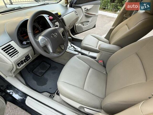 Черный Тойота Королла, объемом двигателя 1.8 л и пробегом 289 тыс. км за 7599 $, фото 2 на Automoto.ua