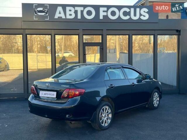 Черный Тойота Королла, объемом двигателя 1.6 л и пробегом 186 тыс. км за 7490 $, фото 6 на Automoto.ua