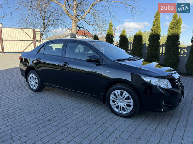 Черный Тойота Королла, объемом двигателя 1.6 л и пробегом 147 тыс. км за 6999 $, фото 18 на Automoto.ua