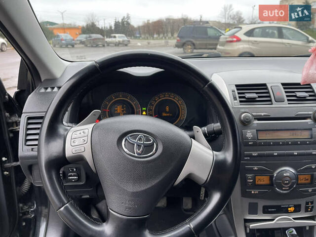 Чорний Тойота Королла, об'ємом двигуна 1.6 л та пробігом 208 тис. км за 7200 $, фото 11 на Automoto.ua