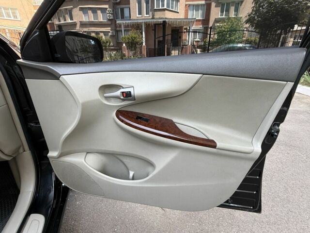 Чорний Тойота Королла, об'ємом двигуна 1.8 л та пробігом 191 тис. км за 7599 $, фото 21 на Automoto.ua