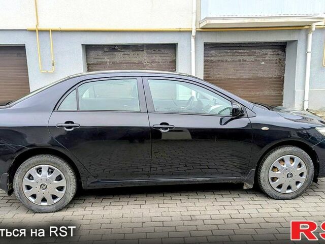 Чорний Тойота Королла, об'ємом двигуна 1.6 л та пробігом 197 тис. км за 6000 $, фото 6 на Automoto.ua