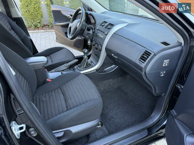 Черный Тойота Королла, объемом двигателя 1.6 л и пробегом 147 тыс. км за 6999 $, фото 48 на Automoto.ua