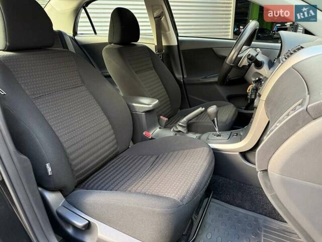 Черный Тойота Королла, объемом двигателя 1.6 л и пробегом 186 тыс. км за 7990 $, фото 11 на Automoto.ua