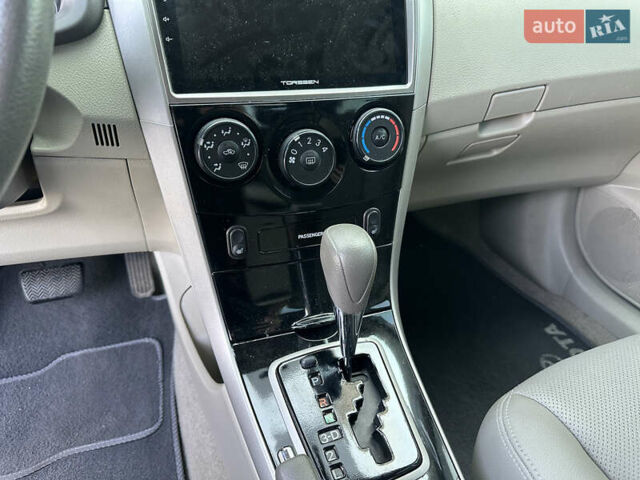 Черный Тойота Королла, объемом двигателя 1.6 л и пробегом 130 тыс. км за 9850 $, фото 1 на Automoto.ua