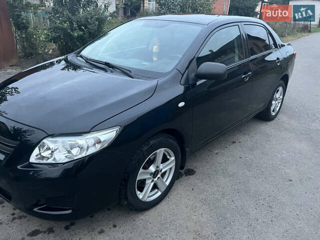 Черный Тойота Королла, объемом двигателя 1.3 л и пробегом 172 тыс. км за 5650 $, фото 17 на Automoto.ua
