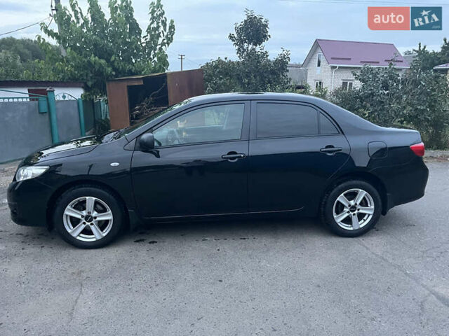 Черный Тойота Королла, объемом двигателя 1.3 л и пробегом 172 тыс. км за 5650 $, фото 35 на Automoto.ua
