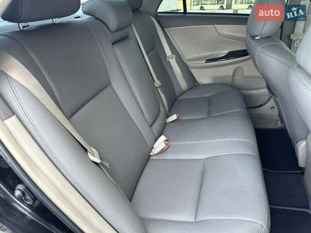 Черный Тойота Королла, объемом двигателя 1.6 л и пробегом 130 тыс. км за 9850 $, фото 25 на Automoto.ua