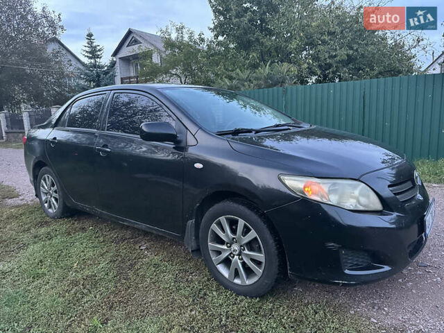 Черный Тойота Королла, объемом двигателя 1.6 л и пробегом 220 тыс. км за 5900 $, фото 4 на Automoto.ua