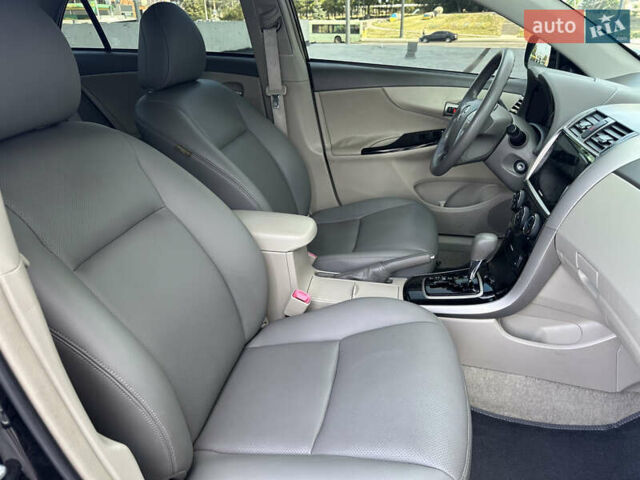 Черный Тойота Королла, объемом двигателя 1.6 л и пробегом 130 тыс. км за 9850 $, фото 27 на Automoto.ua