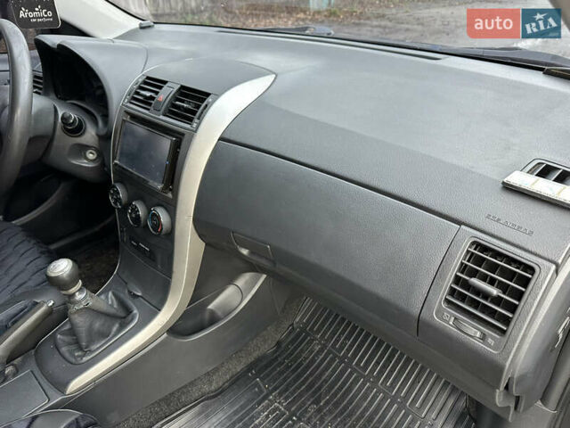 Черный Тойота Королла, объемом двигателя 1.33 л и пробегом 251 тыс. км за 5500 $, фото 9 на Automoto.ua