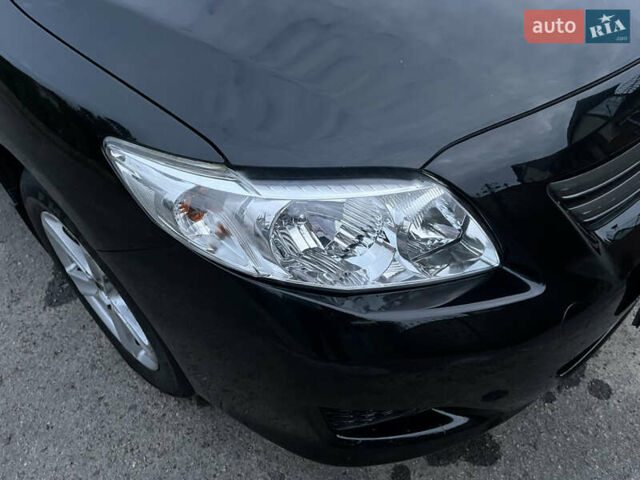 Черный Тойота Королла, объемом двигателя 1.3 л и пробегом 172 тыс. км за 5650 $, фото 6 на Automoto.ua