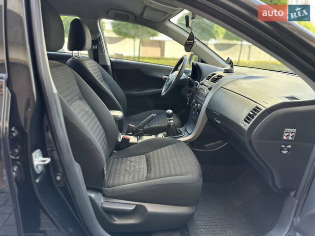 Черный Тойота Королла, объемом двигателя 1.3 л и пробегом 160 тыс. км за 7500 $, фото 7 на Automoto.ua