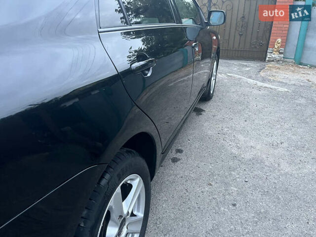 Черный Тойота Королла, объемом двигателя 1.3 л и пробегом 172 тыс. км за 5650 $, фото 23 на Automoto.ua