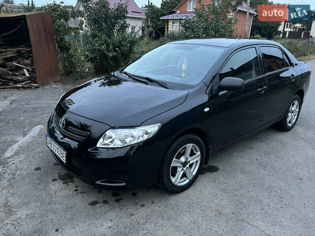 Черный Тойота Королла, объемом двигателя 1.3 л и пробегом 172 тыс. км за 5650 $, фото 1 на Automoto.ua