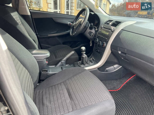 Черный Тойота Королла, объемом двигателя 1.33 л и пробегом 237 тыс. км за 5450 $, фото 13 на Automoto.ua