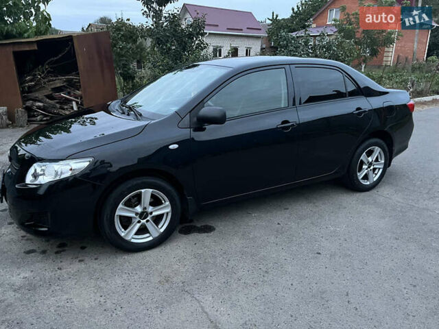 Черный Тойота Королла, объемом двигателя 1.3 л и пробегом 172 тыс. км за 5650 $, фото 2 на Automoto.ua