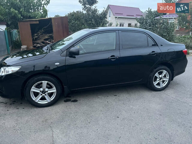 Черный Тойота Королла, объемом двигателя 1.3 л и пробегом 172 тыс. км за 5650 $, фото 16 на Automoto.ua