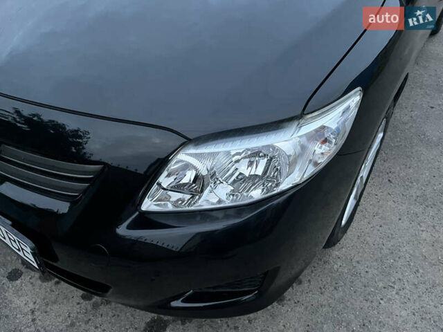 Черный Тойота Королла, объемом двигателя 1.3 л и пробегом 172 тыс. км за 5650 $, фото 5 на Automoto.ua