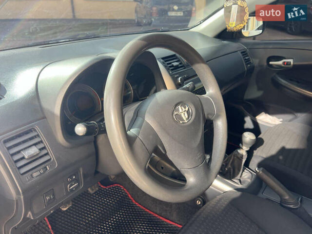 Черный Тойота Королла, объемом двигателя 1.33 л и пробегом 237 тыс. км за 5450 $, фото 16 на Automoto.ua