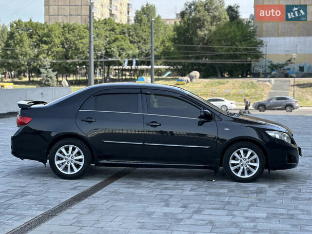 Черный Тойота Королла, объемом двигателя 1.6 л и пробегом 130 тыс. км за 9850 $, фото 3 на Automoto.ua