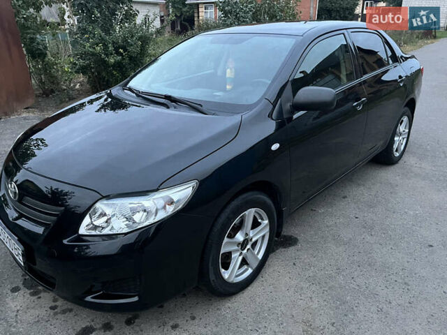 Черный Тойота Королла, объемом двигателя 1.3 л и пробегом 172 тыс. км за 5650 $, фото 4 на Automoto.ua