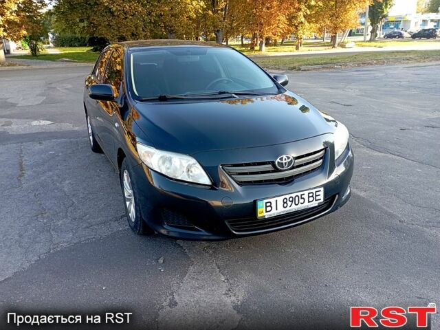 Черный Тойота Королла, объемом двигателя 1.3 л и пробегом 200 тыс. км за 6800 $, фото 1 на Automoto.ua