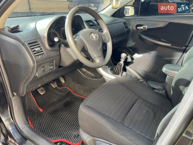 Черный Тойота Королла, объемом двигателя 1.33 л и пробегом 237 тыс. км за 5450 $, фото 17 на Automoto.ua