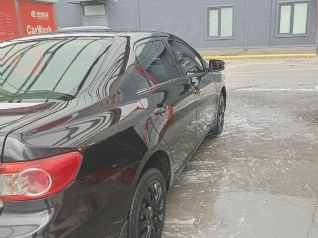 Чорний Тойота Королла, об'ємом двигуна 1.3 л та пробігом 199 тис. км за 7000 $, фото 1 на Automoto.ua