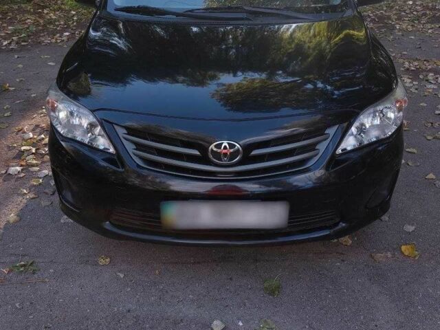 Черный Тойота Королла, объемом двигателя 1.3 л и пробегом 115 тыс. км за 5499 $, фото 3 на Automoto.ua