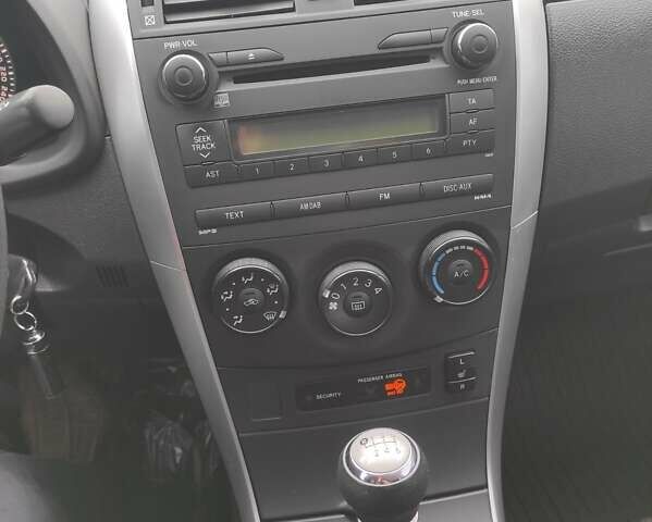 Черный Тойота Королла, объемом двигателя 1.33 л и пробегом 151 тыс. км за 7000 $, фото 7 на Automoto.ua