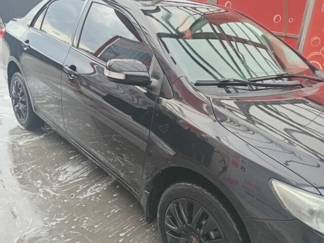 Чорний Тойота Королла, об'ємом двигуна 1.3 л та пробігом 199 тис. км за 7000 $, фото 6 на Automoto.ua