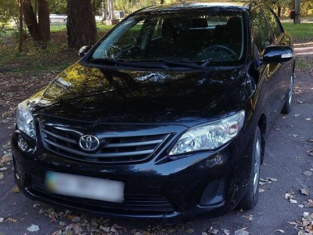 Черный Тойота Королла, объемом двигателя 1.3 л и пробегом 115 тыс. км за 5499 $, фото 6 на Automoto.ua