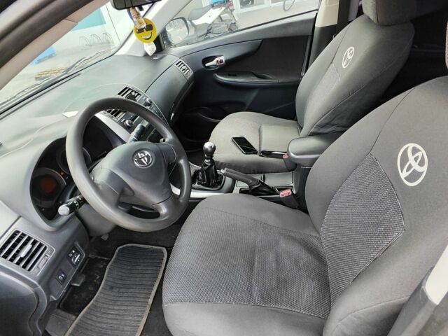 Черный Тойота Королла, объемом двигателя 1.33 л и пробегом 219 тыс. км за 6000 $, фото 2 на Automoto.ua