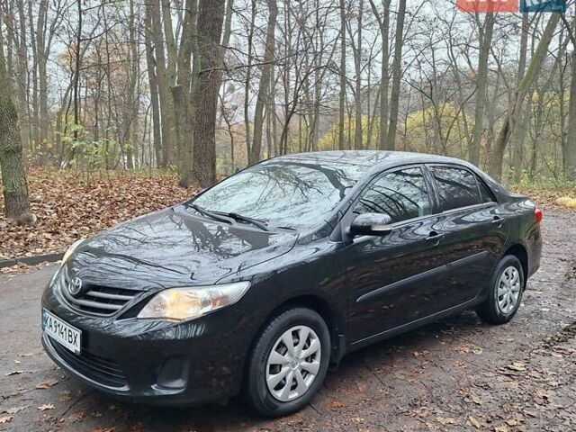 Черный Тойота Королла, объемом двигателя 1.33 л и пробегом 119 тыс. км за 8000 $, фото 1 на Automoto.ua