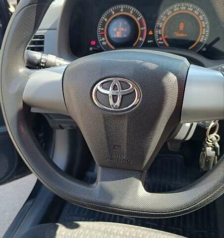 Черный Тойота Королла, объемом двигателя 1.33 л и пробегом 72 тыс. км за 8700 $, фото 5 на Automoto.ua