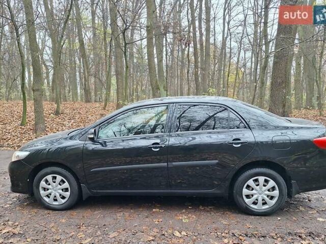 Черный Тойота Королла, объемом двигателя 1.33 л и пробегом 119 тыс. км за 8000 $, фото 2 на Automoto.ua