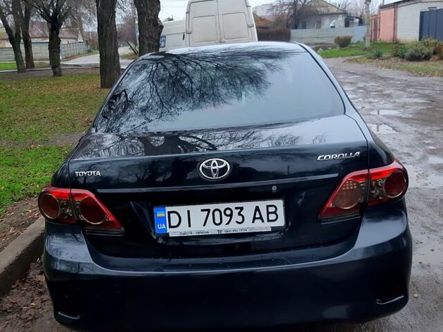 Черный Тойота Королла, объемом двигателя 1.3 л и пробегом 98 тыс. км за 8700 $, фото 2 на Automoto.ua