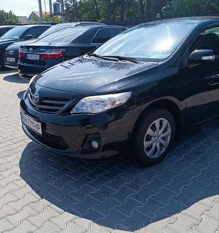 Черный Тойота Королла, объемом двигателя 1.33 л и пробегом 72 тыс. км за 8700 $, фото 16 на Automoto.ua