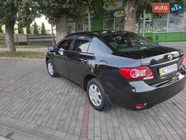 Черный Тойота Королла, объемом двигателя 1.33 л и пробегом 151 тыс. км за 7000 $, фото 1 на Automoto.ua