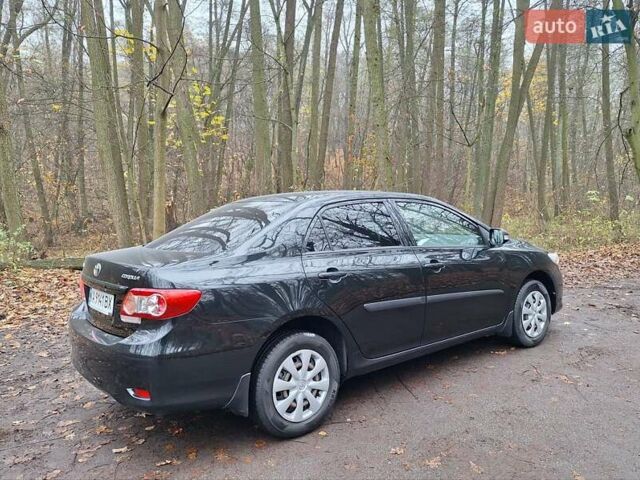 Черный Тойота Королла, объемом двигателя 1.33 л и пробегом 119 тыс. км за 8000 $, фото 5 на Automoto.ua