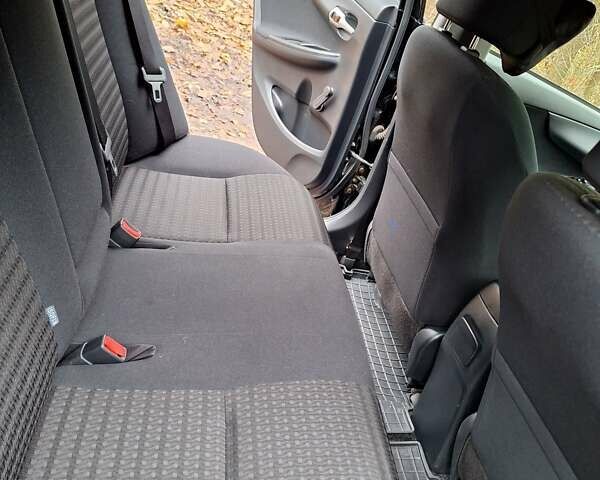 Черный Тойота Королла, объемом двигателя 1.33 л и пробегом 119 тыс. км за 8000 $, фото 13 на Automoto.ua