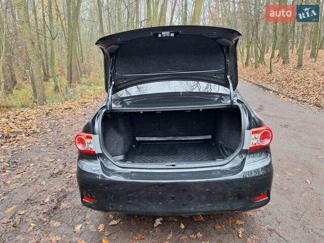 Черный Тойота Королла, объемом двигателя 1.33 л и пробегом 119 тыс. км за 8000 $, фото 8 на Automoto.ua