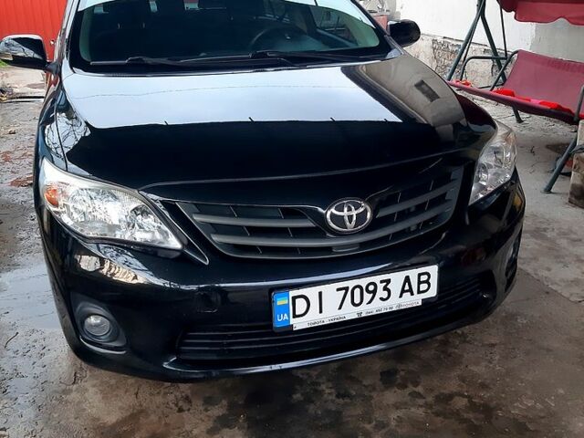 Черный Тойота Королла, объемом двигателя 1.3 л и пробегом 98 тыс. км за 8700 $, фото 6 на Automoto.ua