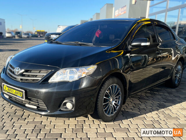 Черный Тойота Королла, объемом двигателя 1.4 л и пробегом 169 тыс. км за 8000 $, фото 1 на Automoto.ua