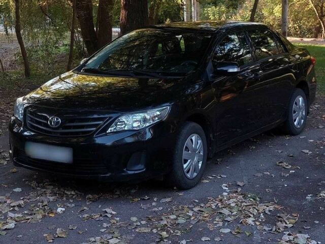 Черный Тойота Королла, объемом двигателя 1.3 л и пробегом 115 тыс. км за 5499 $, фото 1 на Automoto.ua