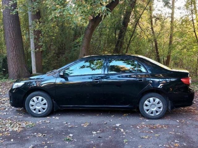 Черный Тойота Королла, объемом двигателя 1.3 л и пробегом 115 тыс. км за 5499 $, фото 2 на Automoto.ua