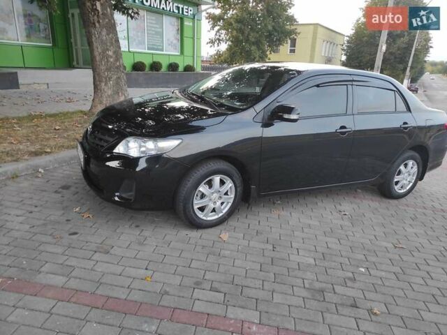 Черный Тойота Королла, объемом двигателя 1.33 л и пробегом 151 тыс. км за 7000 $, фото 2 на Automoto.ua