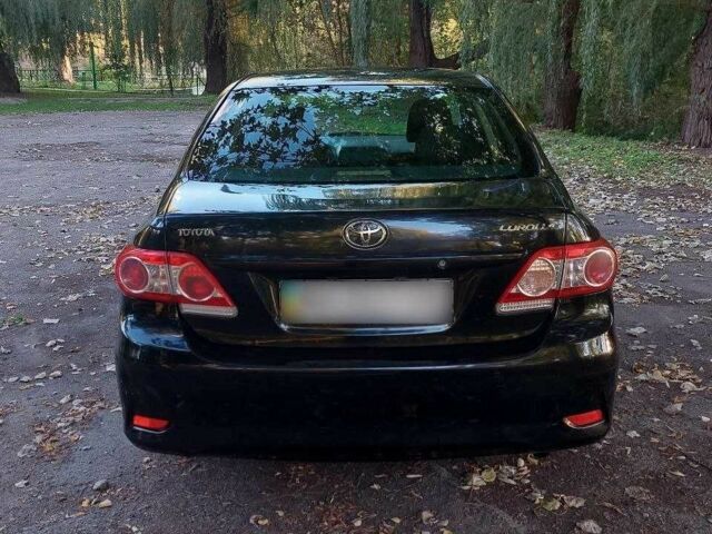 Черный Тойота Королла, объемом двигателя 1.3 л и пробегом 115 тыс. км за 5499 $, фото 4 на Automoto.ua